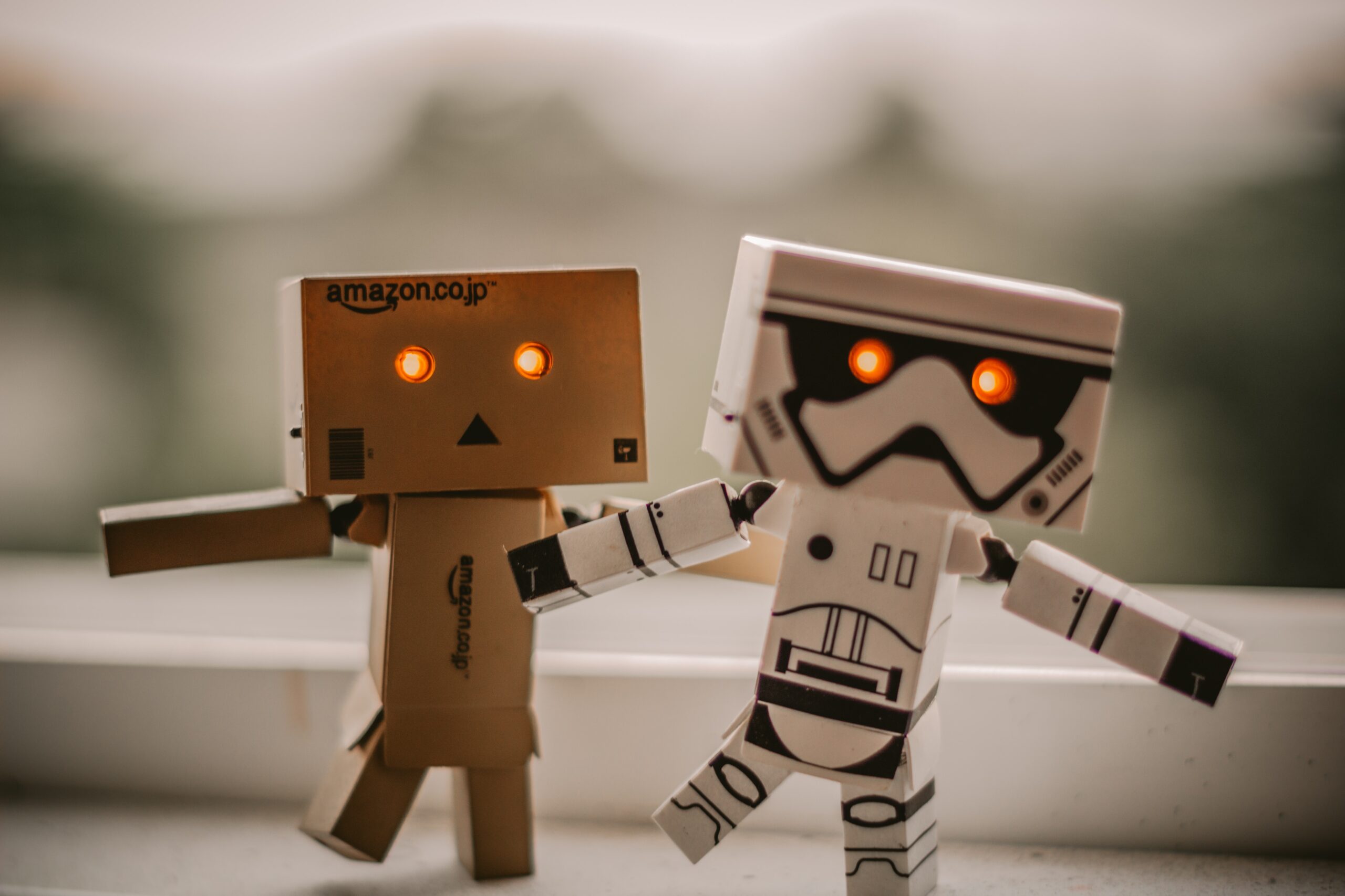 Cardboard androids walking with glowing eyes